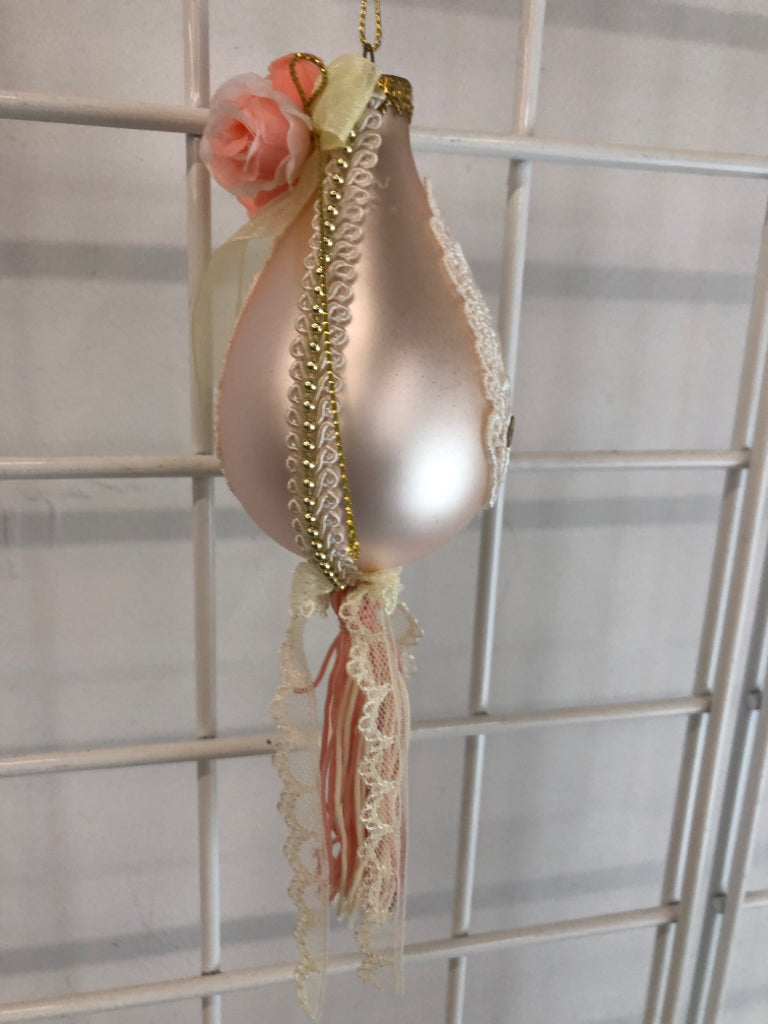 LACE PINK BULB ORNAMENT W/COLORFUL TASSELS.