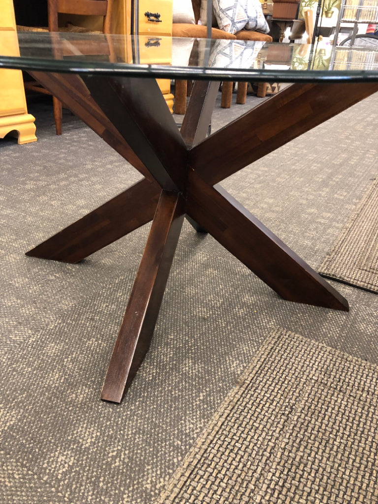 CIRCLE LOW GLASS COFFEE TABLE W/ DARK BASE.