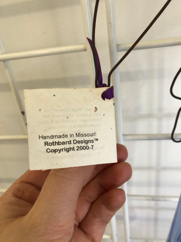 BLOWN GLASS BUD VASE WALL HANGING.