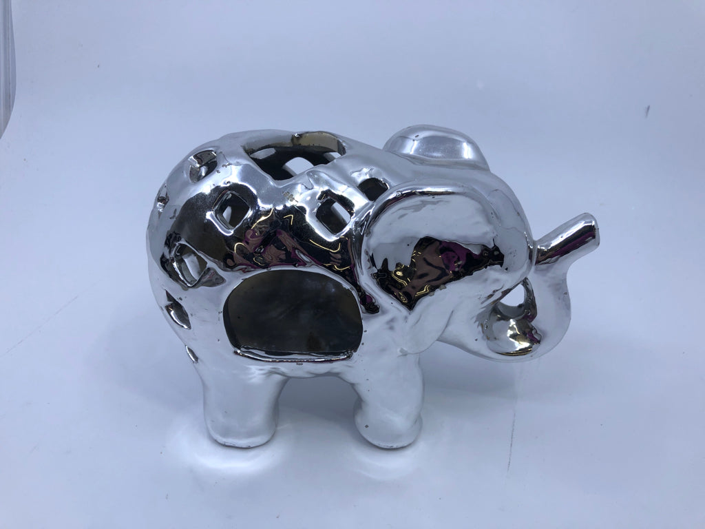 SILVER PIERCED ELEPHANT TEAL LIGHT HOLDER.