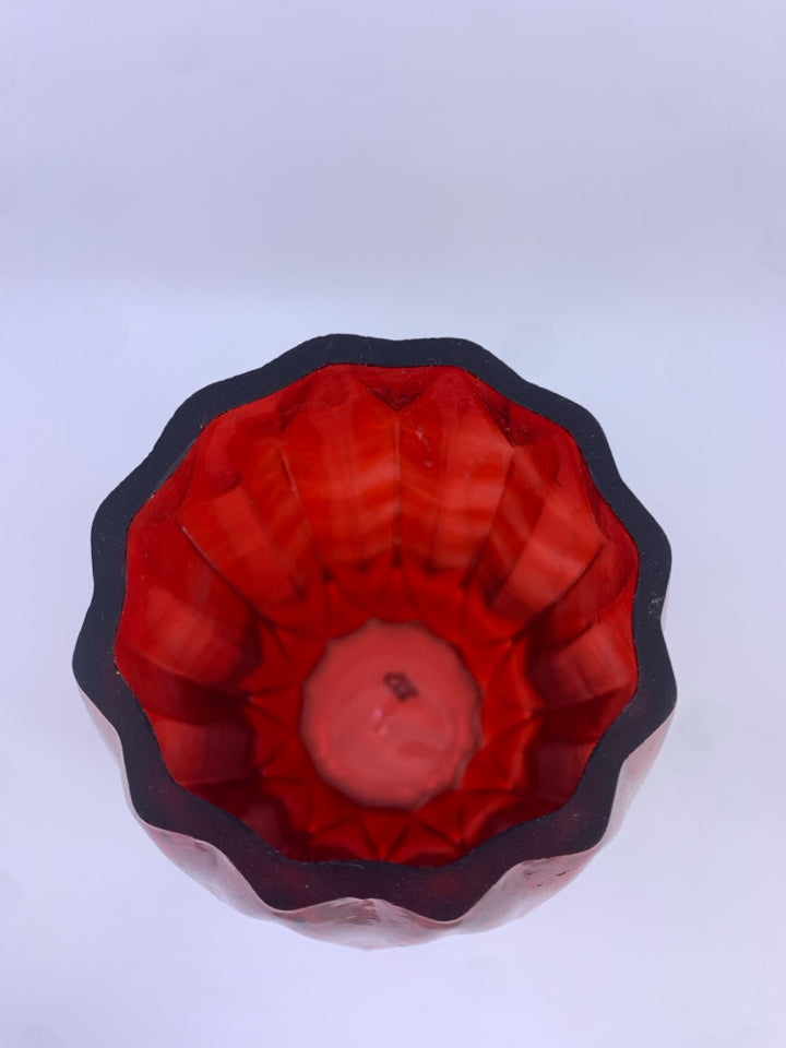 RED GLASS RIBBED VASE.