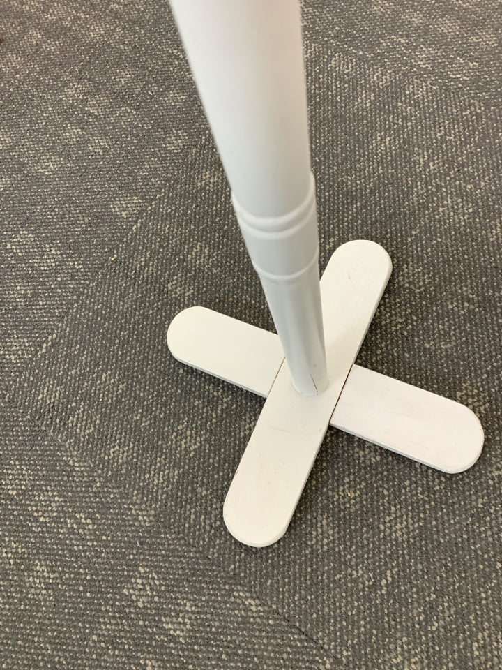WHITE WOODEN COAT RACK.