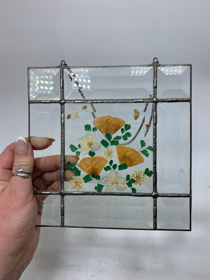 STAINED GLASS W/ PRESSED FLOWERS IN CENTER WALL HANGING.