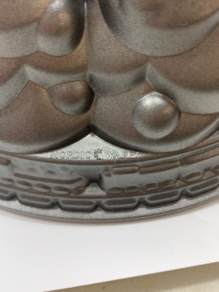 NORDIC WARE HOLIDAY TREE BUNDT PAN.