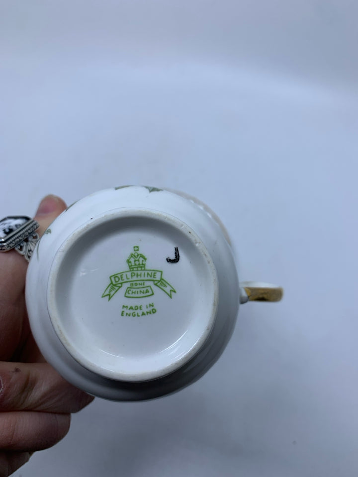 WHITE ROSES TEA CUP/SAUCER.