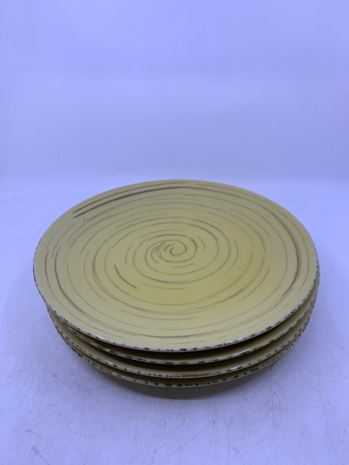 4 YELLOW DINNER PLATES W/ BROWN SWIRL.