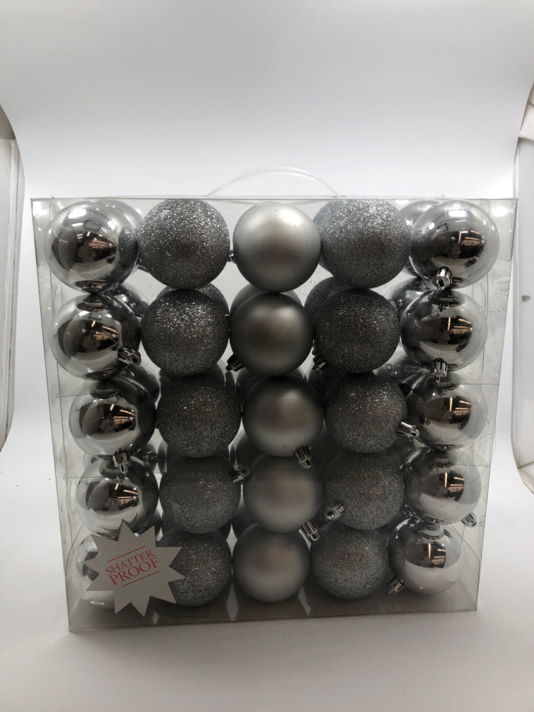 NIP 50PC SILVER ORNAMENTS.