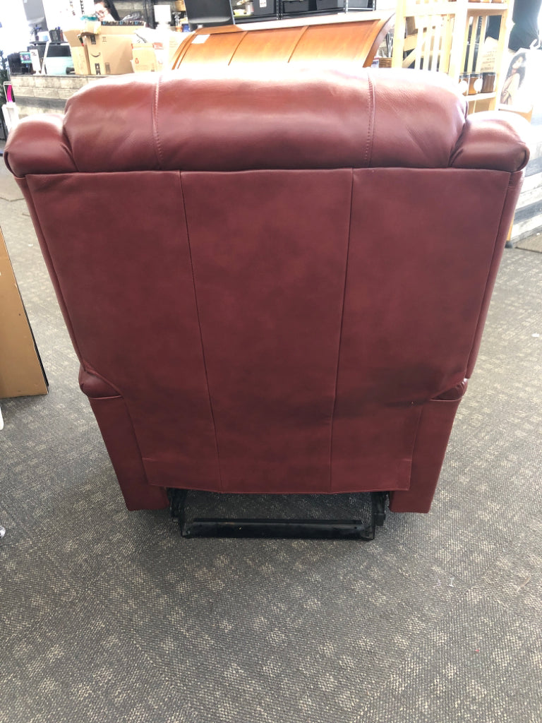 RED LEATHER RECLINER W/GOLD BUTTON DETAILS.