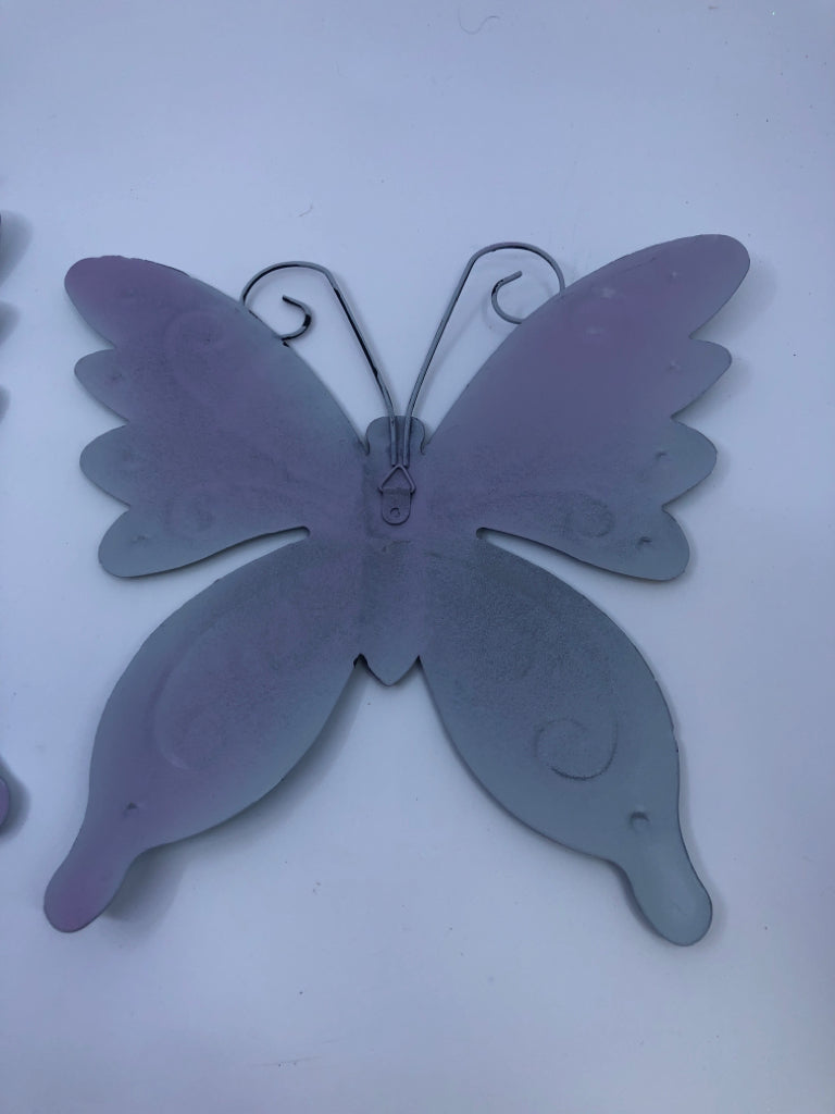 2 BLUE METAL HANGING BUTTERFLIES.