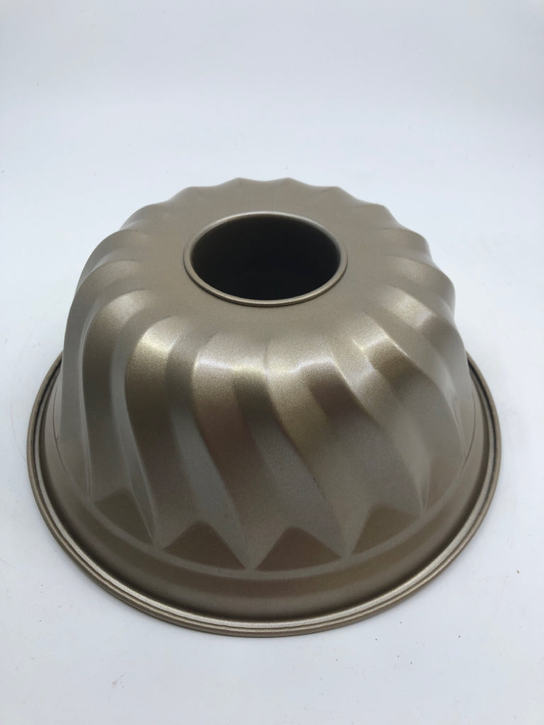 GOLD BUNDT PAN.