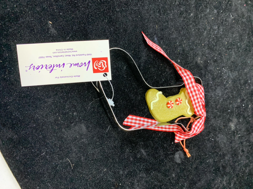 SILVER METAL STOCKING COOKIE CUTTER ORNAMENT.