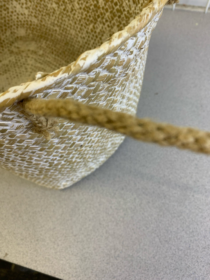CREAM AND BROWN OVAL BASKET W HANDLES.