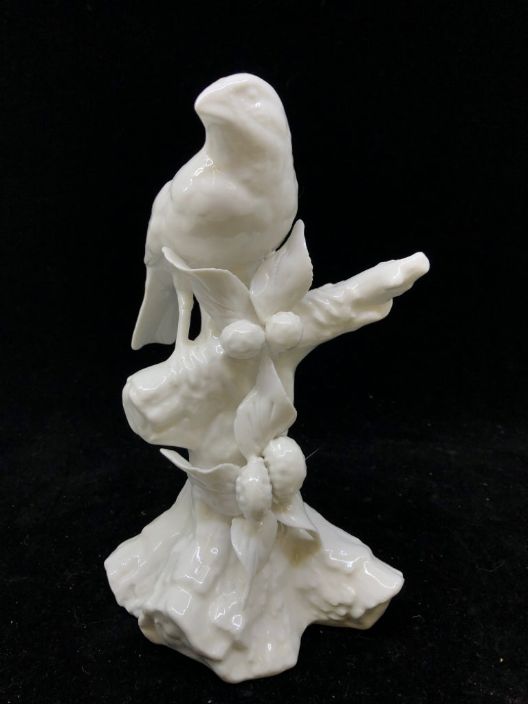WHITE CERAMIC BIRD ON BRANCH.