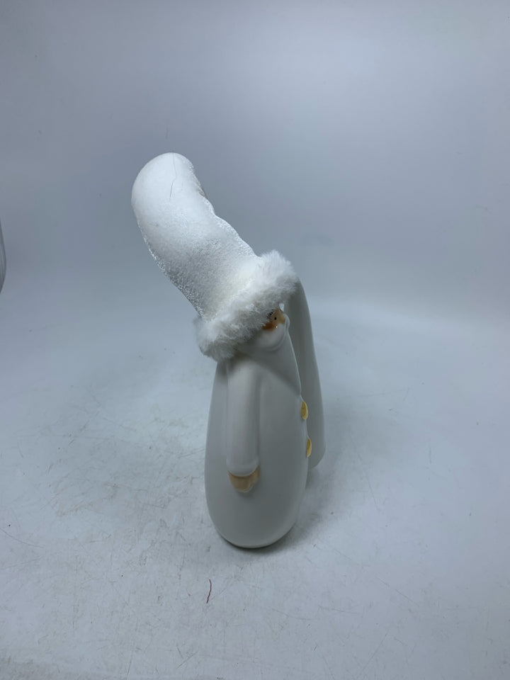 CERAMIC WHITE SANTA HOLDING TREE W/ W/ FABRIC HAT.