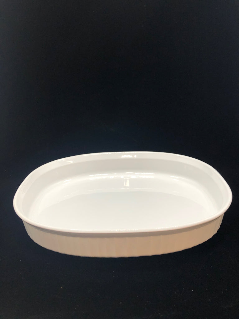 WHITE OVAL CASSEROLE DISH.