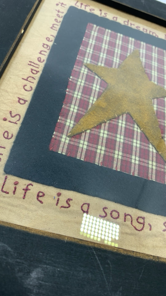 PRIMITIVE LIFE IS A DREAM FABRIC PRINT IN BLACK DISTRESSED FRAME.
