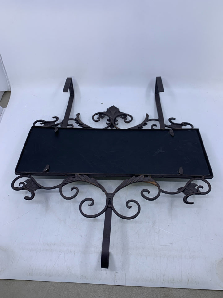 BROWN METAL SCROLL OVER THE DOOR HOOK W/ CHALK BOARD FRONT.