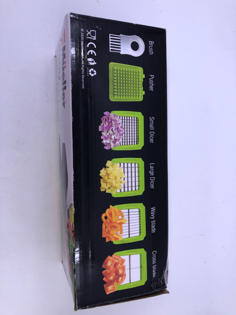 NIB ONION CHOPPER.