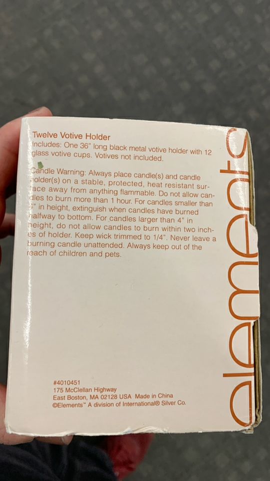 NIB 12 SPOT VOTIVE HOLDER.