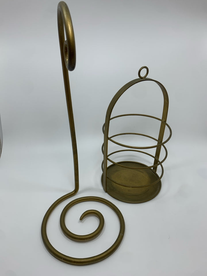 SWINGING GOLD CANDLE LANTERN.
