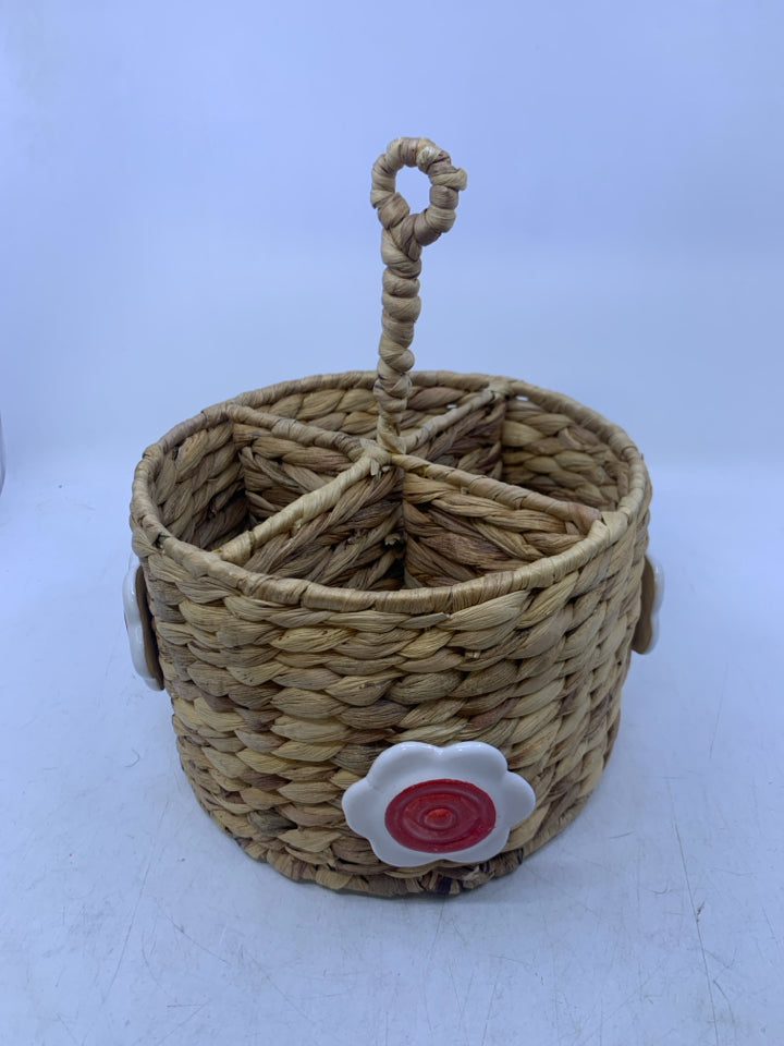 DIVIDED BASKET W/ CERAMIC FLOWERS UTENSIL HOLDER HANDLE IN CENTER.