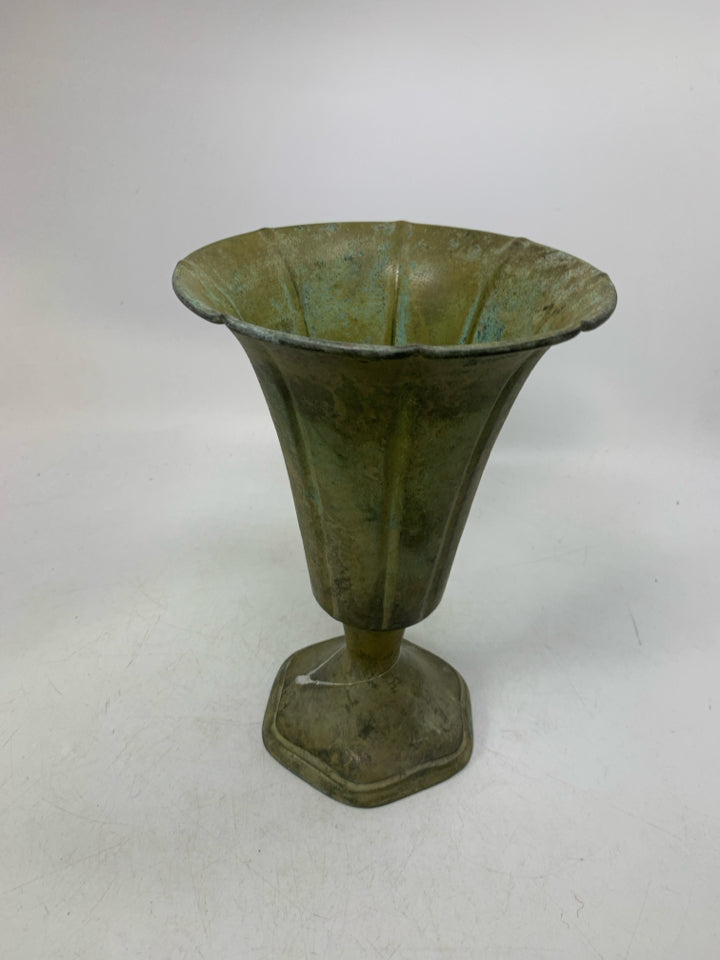 DISTRESSED FOOTED GREEN METAL VASE.