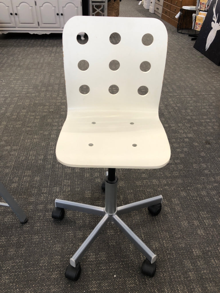 GLASS STUDENT DESK W/WHITE ROLLING CHAIR AND LAP SHELF.