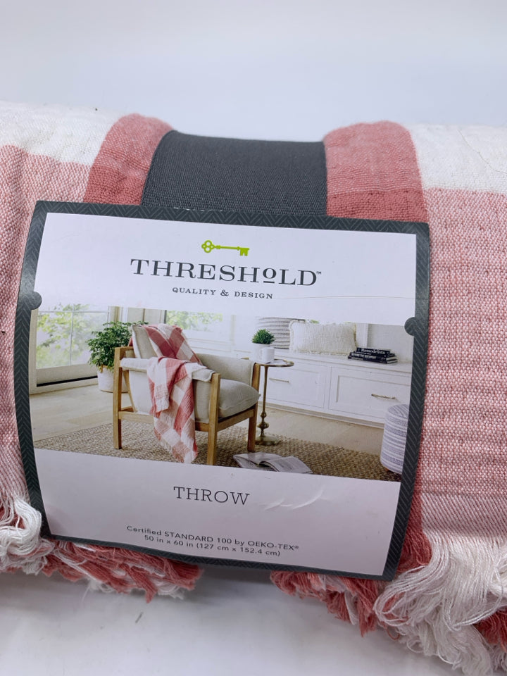 NIP LIGHT PINK THROW BLANKET.