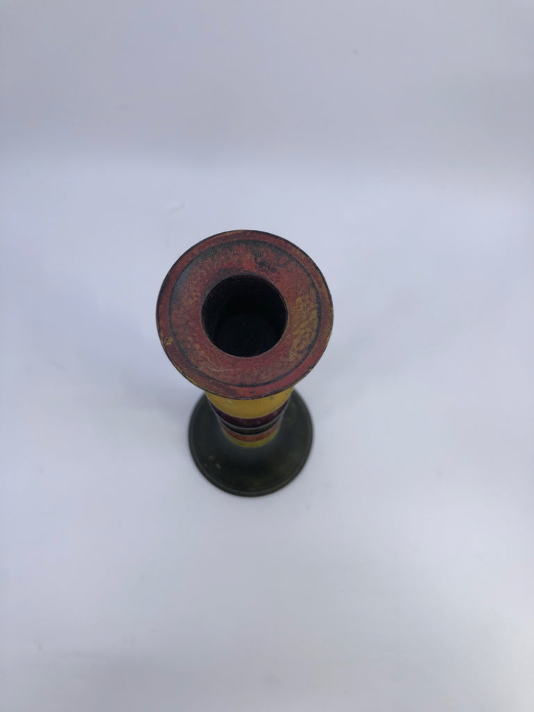 MULTI COLORED DISTRESSED CANDLE HOLDER.