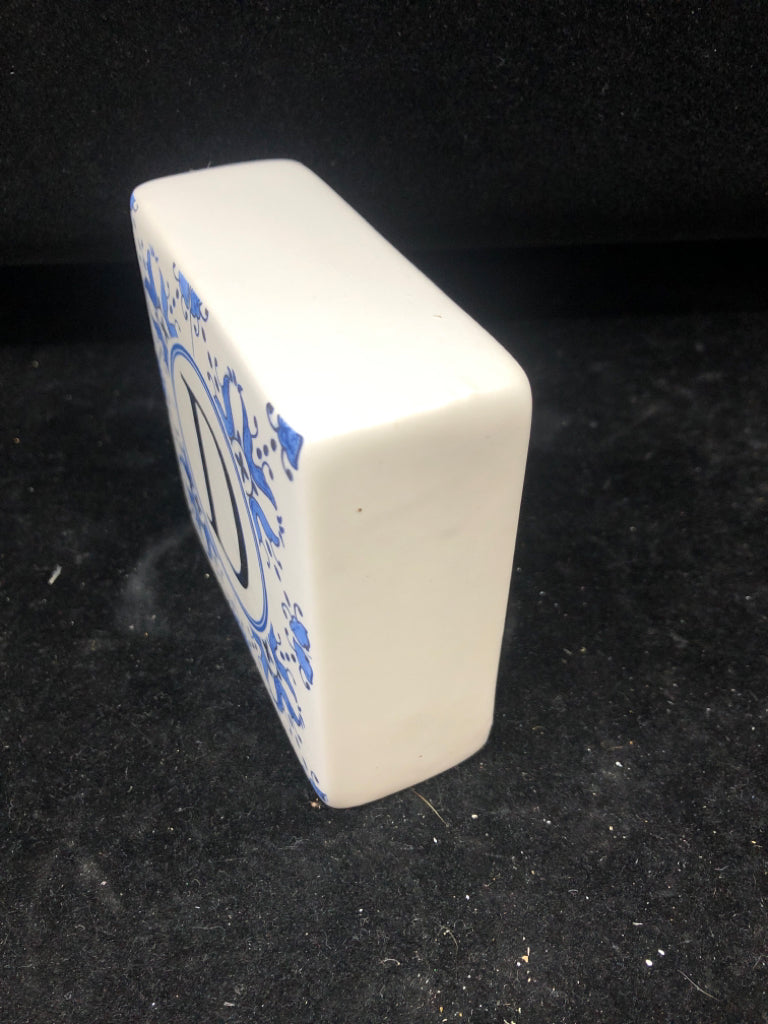 CERAMIC BLUE AND WHITE MONOGRAMMED D.