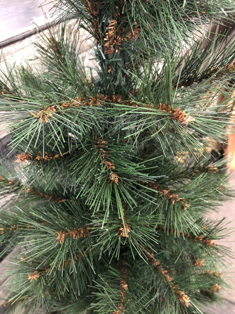 FAUX XMAS TREE IN GOLD PAINTED PLANTER.