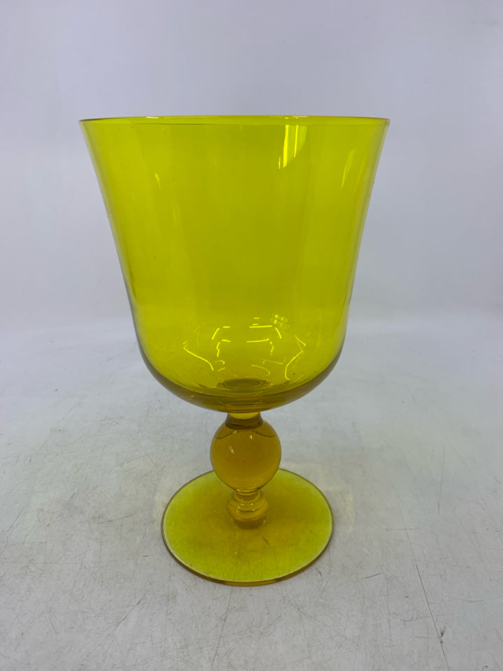 FOOTED THIN GLASS YELLOW PILLAR CANDLE HOLDER.