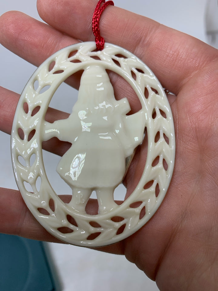 VTG IN BOX CAROLER LENOX ORNAMENT.