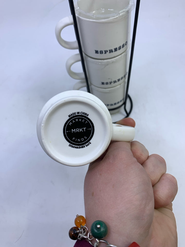 4 WHITE ESPRESSO MUGS IN BLACK STAND.