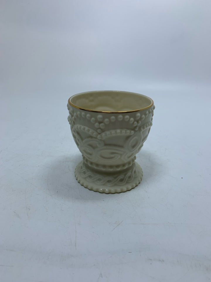 FOOTED BEADED PORCELAIN TEA LIGHT HOLDER.