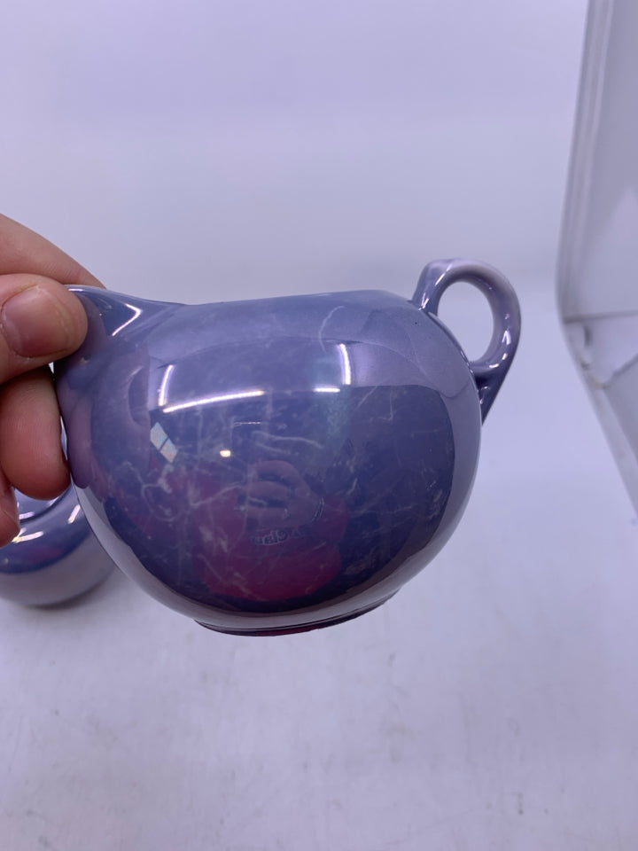 BLUE IRIDESCENT W/ ORANGE INSIDE.