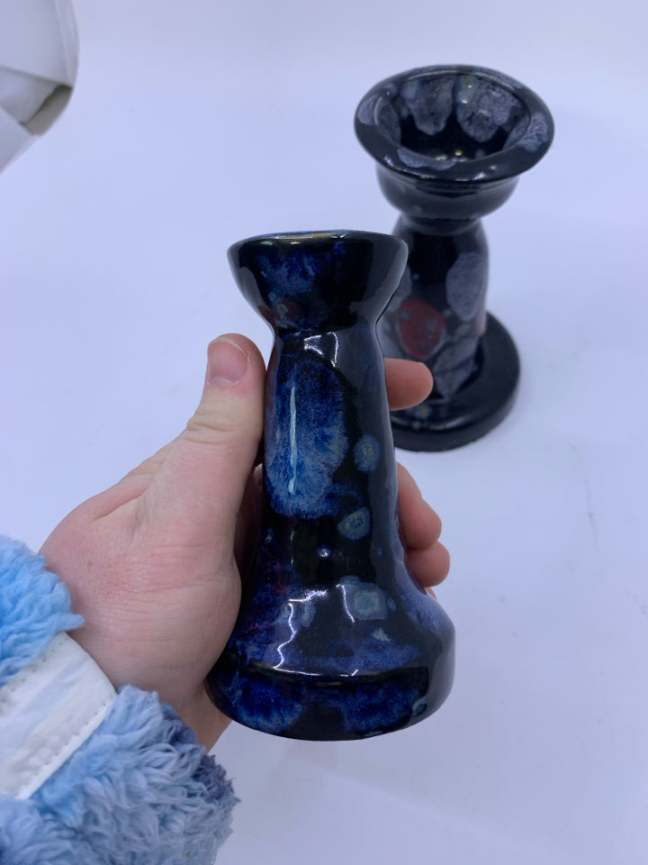 2PC POTTERY CANDLE HOLDER SET.