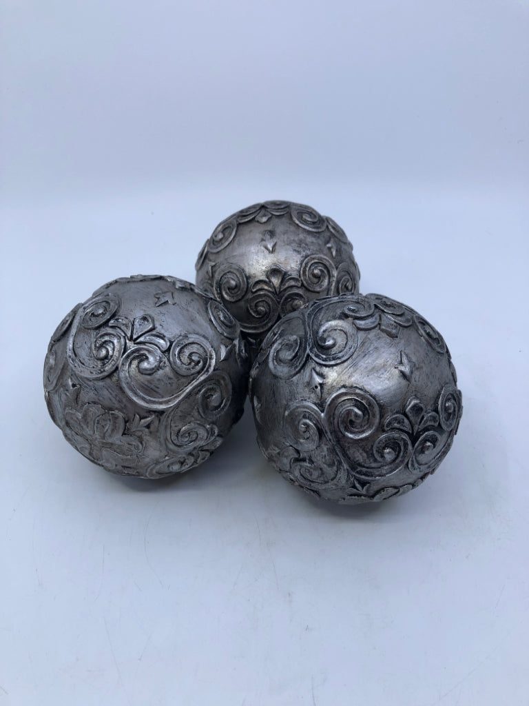 3 SILVER DECORATIVE BALLS.