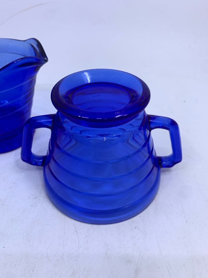 2PC COBALT BLUE RIBBED SUGAR & CREAMER SET.