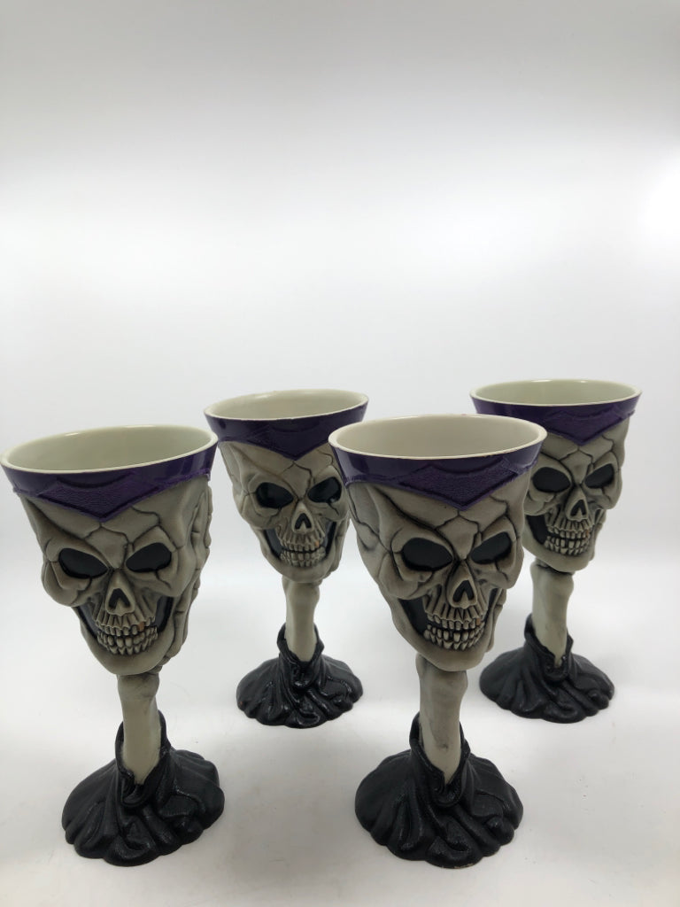 4 GRAY & PURPLE SKULL GOBLETS.