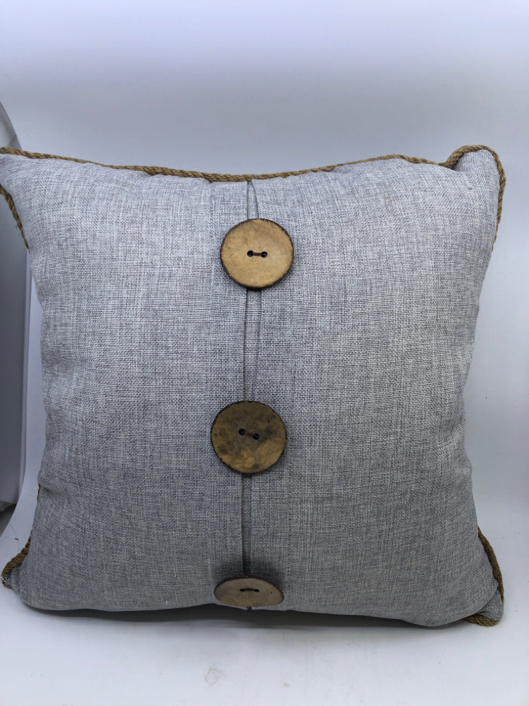 RECTANGLE PILLOW W/ LARGE WOOD BUTTONS/ ROPE TRIM.
