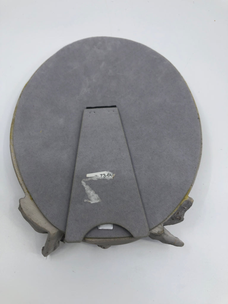 SMALL DISTRESSED OVAL MIRROR W/ EMBOSSED BIRDS.