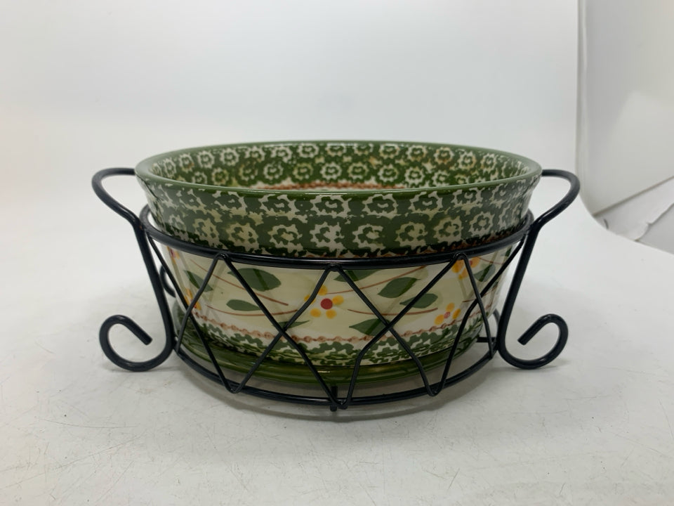 CASSEROLE WITH TRIVET IN STAND.