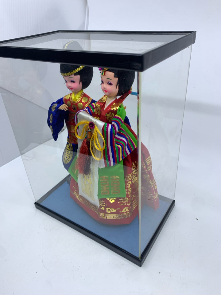 2 ASIAN STYLE DOLLS IN CASE.