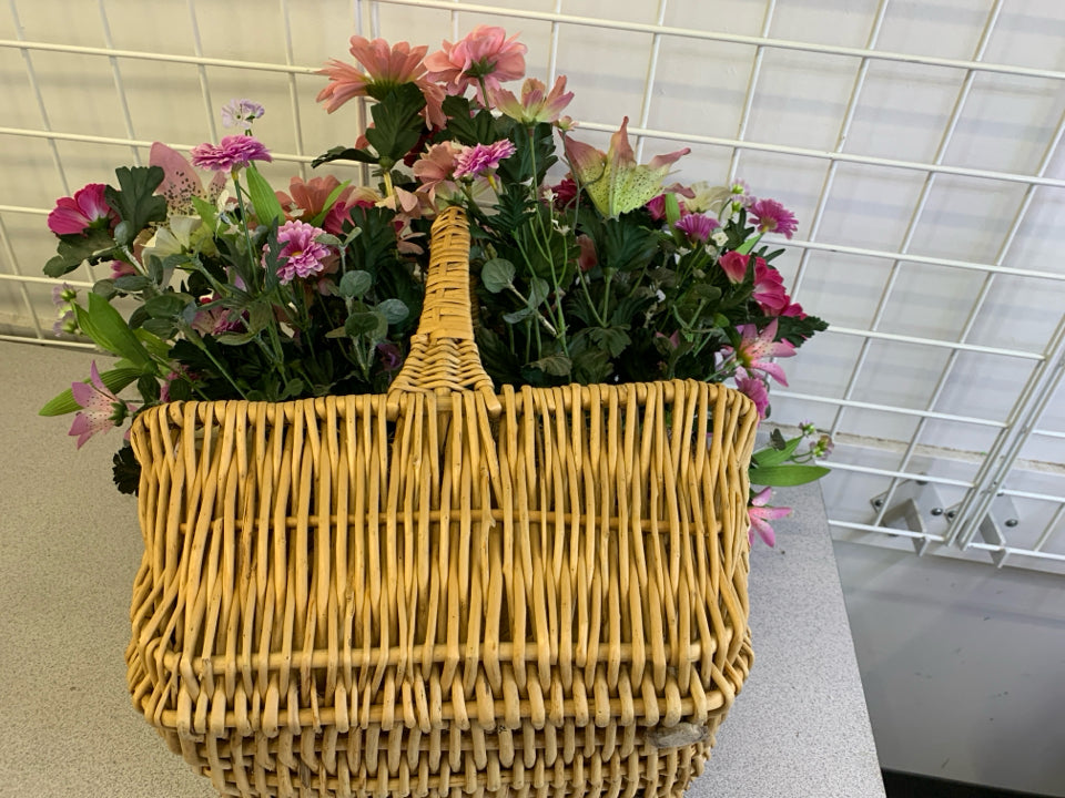 FAUX PINK FLORAL IN BASKET.