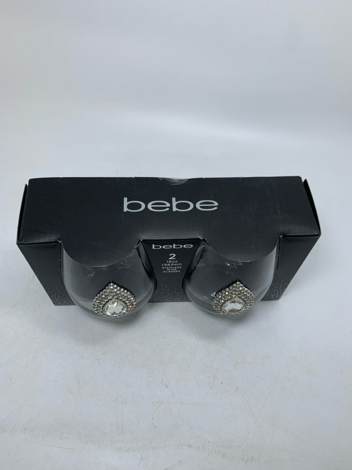NIP 2 BEBE STEMLESS JEWELED CENTER WINE GLASSES.