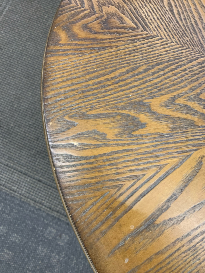 OVAL WOOD W GLASS TOP AND BOTTOM STORAGE COFFEE TABLE.
