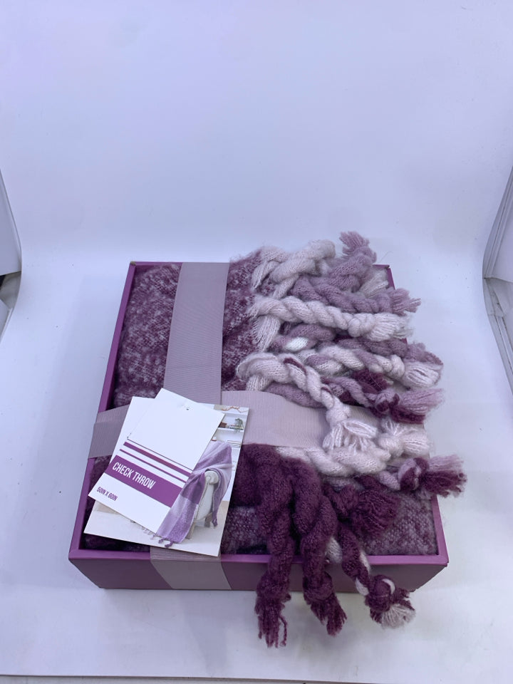 NIB PURPLE THROW CHECK.