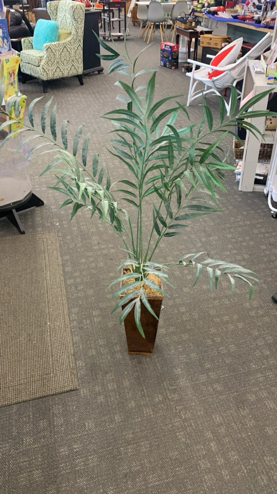 FAUX PALM PLANT IN BROWN RECTANGULAR POT.