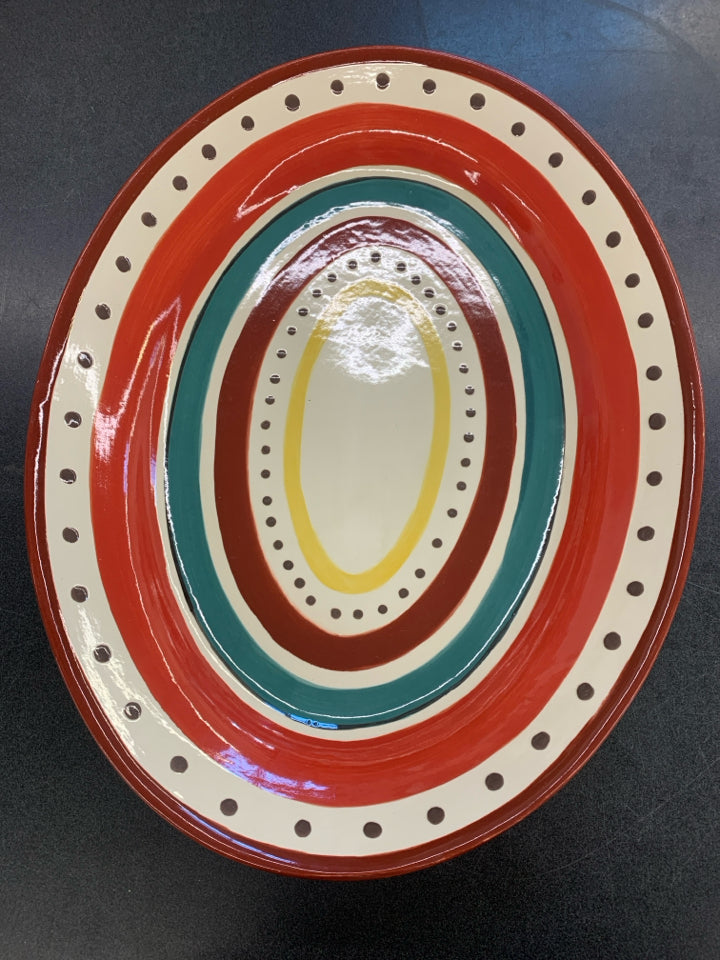 LARGE CERAMIC OVAL SERVING BOWL RED STRIPES/ BROWN POLKA DOTS.